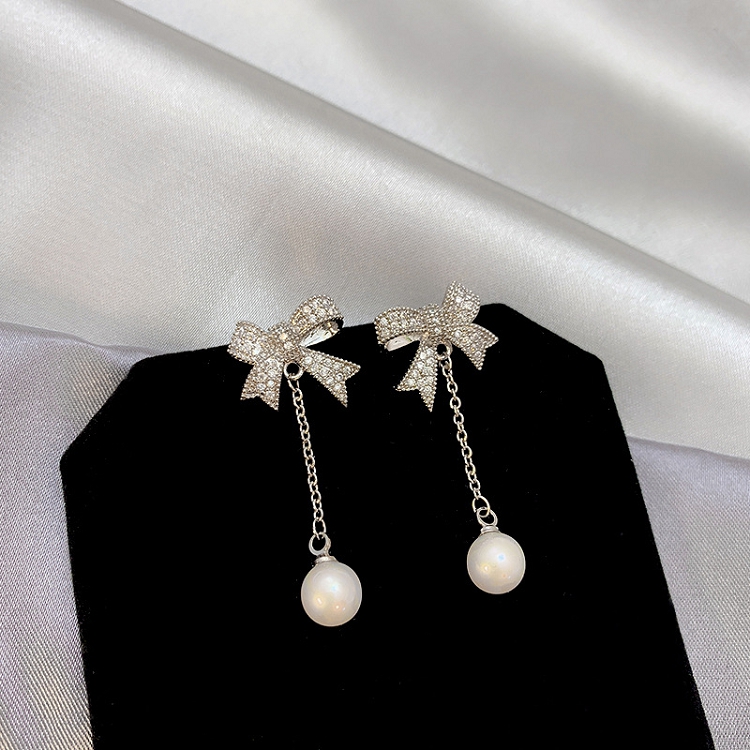 South Korea fashion new 925 silver needle earring bowknot long pearl earring is acted the role of temperament all match micro set ear nail female 